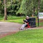 A KCIL member takes a break in Kew Gardens