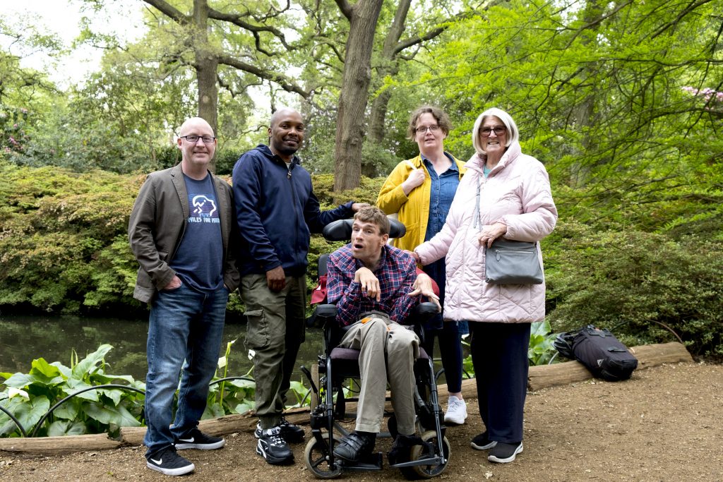 KCIL staff and members stand by a pond in Isabella Plantation