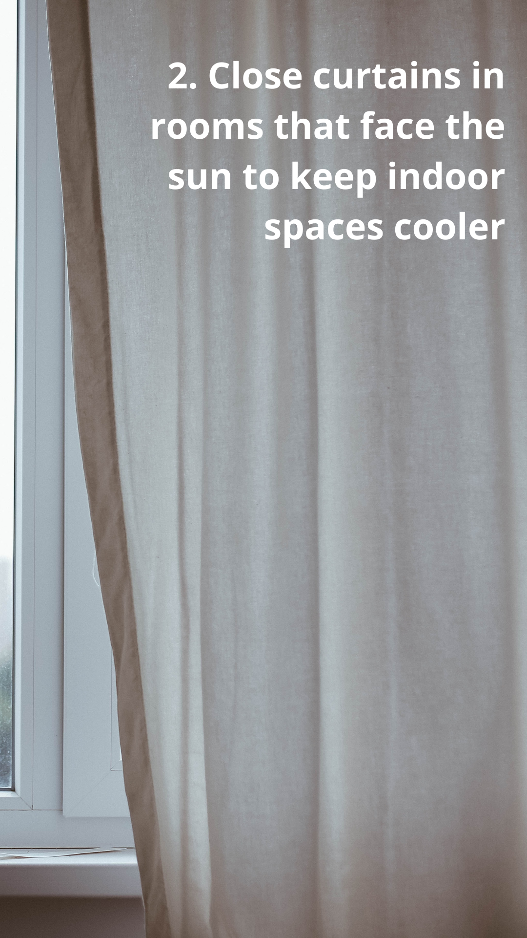 2. Close curtains in rooms that face the sun to keep indoor spaces cooler (photo of closed curtains)