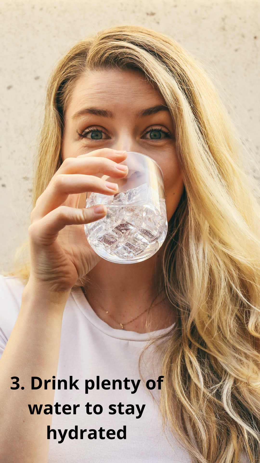 3. Drink plenty of water to stay hydrated (photo of woman drinking water)