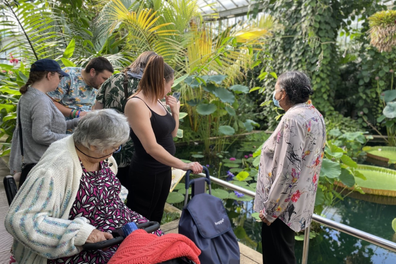 A group in one of the glass houses in Kew Gardens