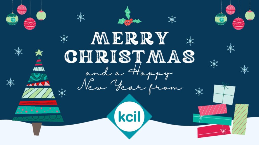 Navy background with white writing, Christmas decorations and the KCIL logo.