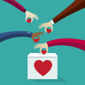 Hands donate hearts into a donation box