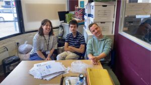 Work experience students in the KCIL office with their teacher