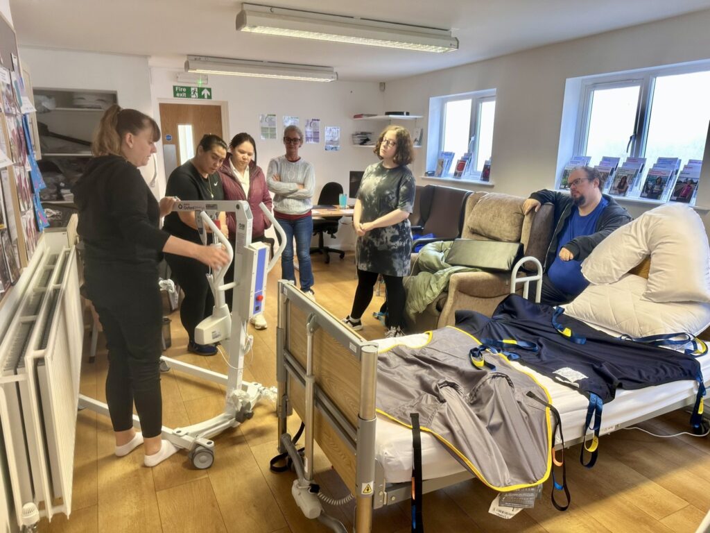 Students and their trainer in the new manual handling training venue