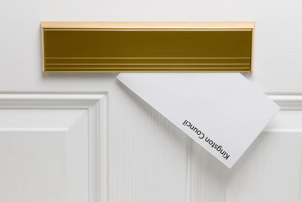 A letter comes through a letter box, with the words 'Kingston Council'