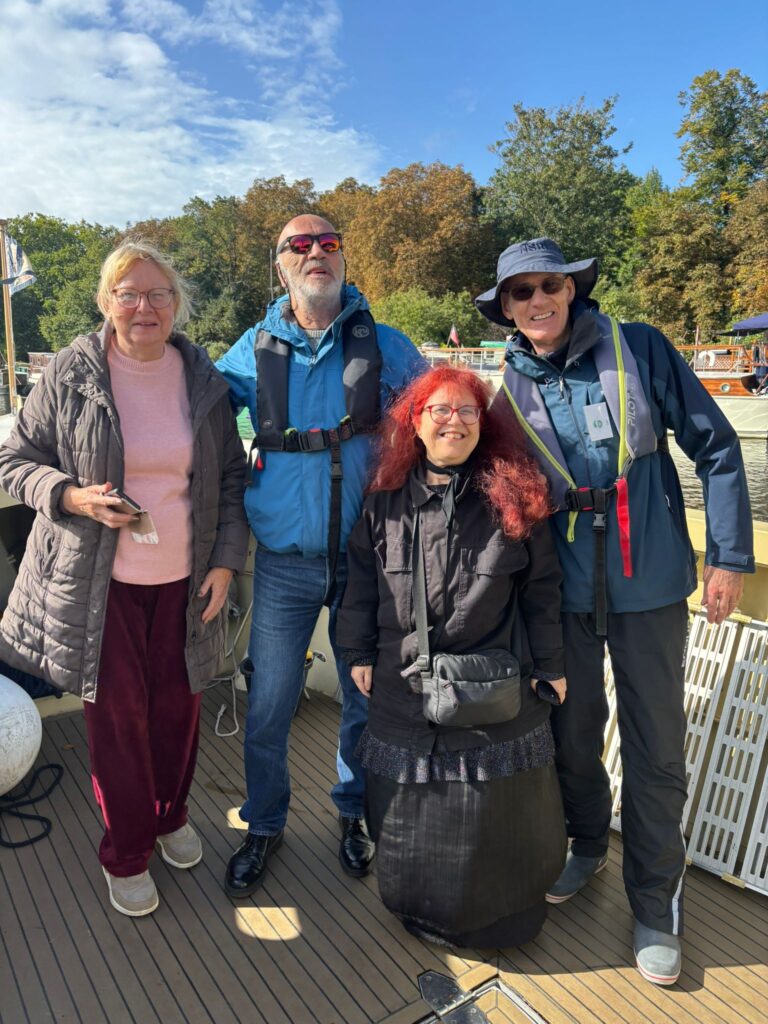 A KCIL member with her PA and two crew members