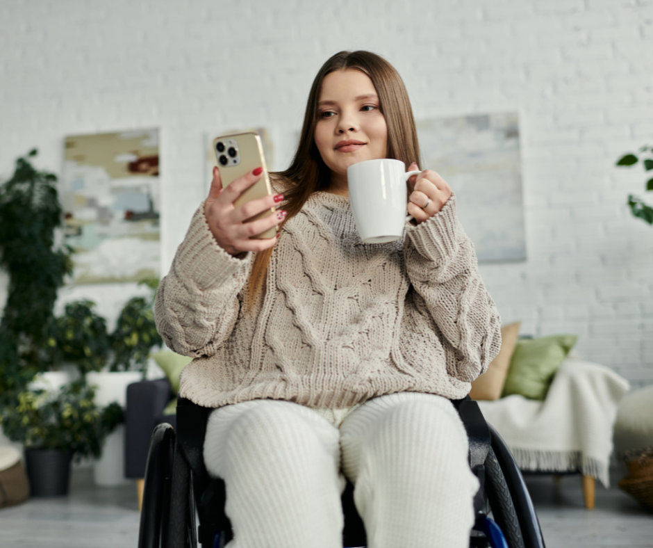 Woman in wheelchair looking at phone